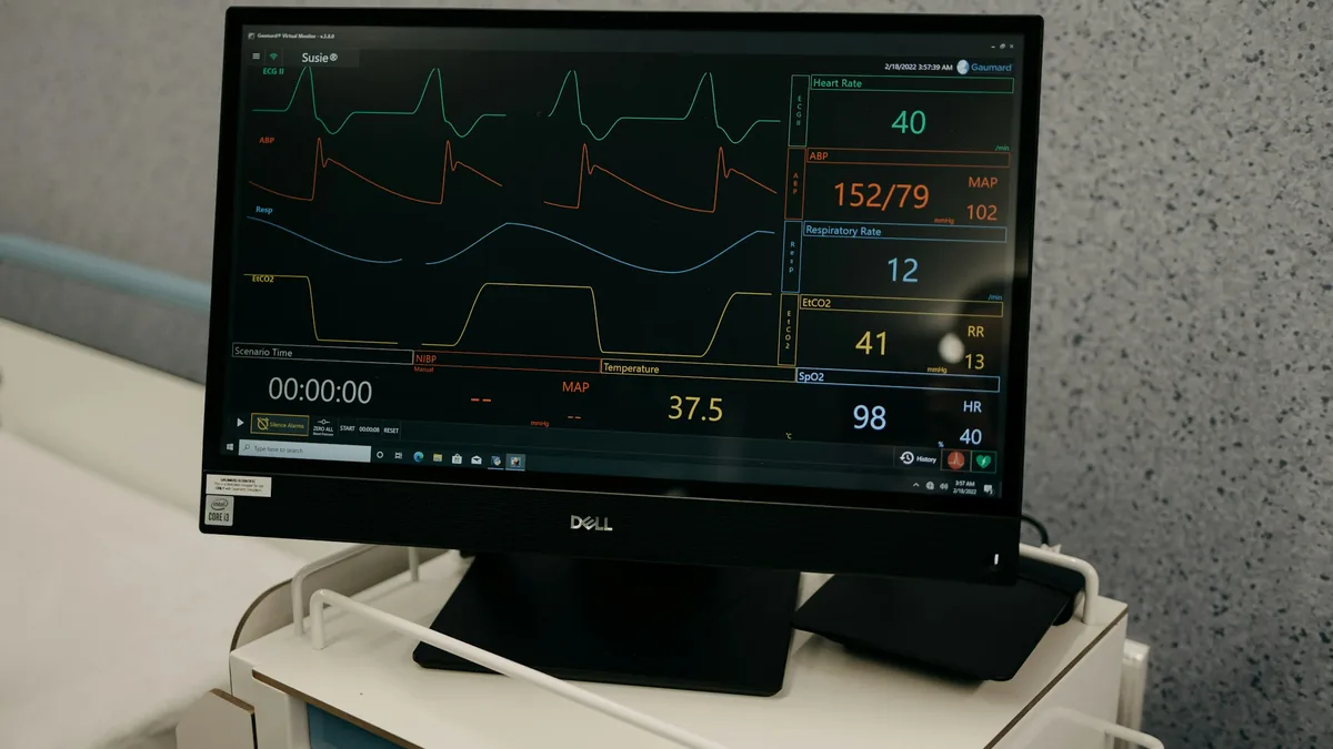 Hospital-at-home care delivery, patient with remote monitoring devices, clinician video visit, home-based acute care setup